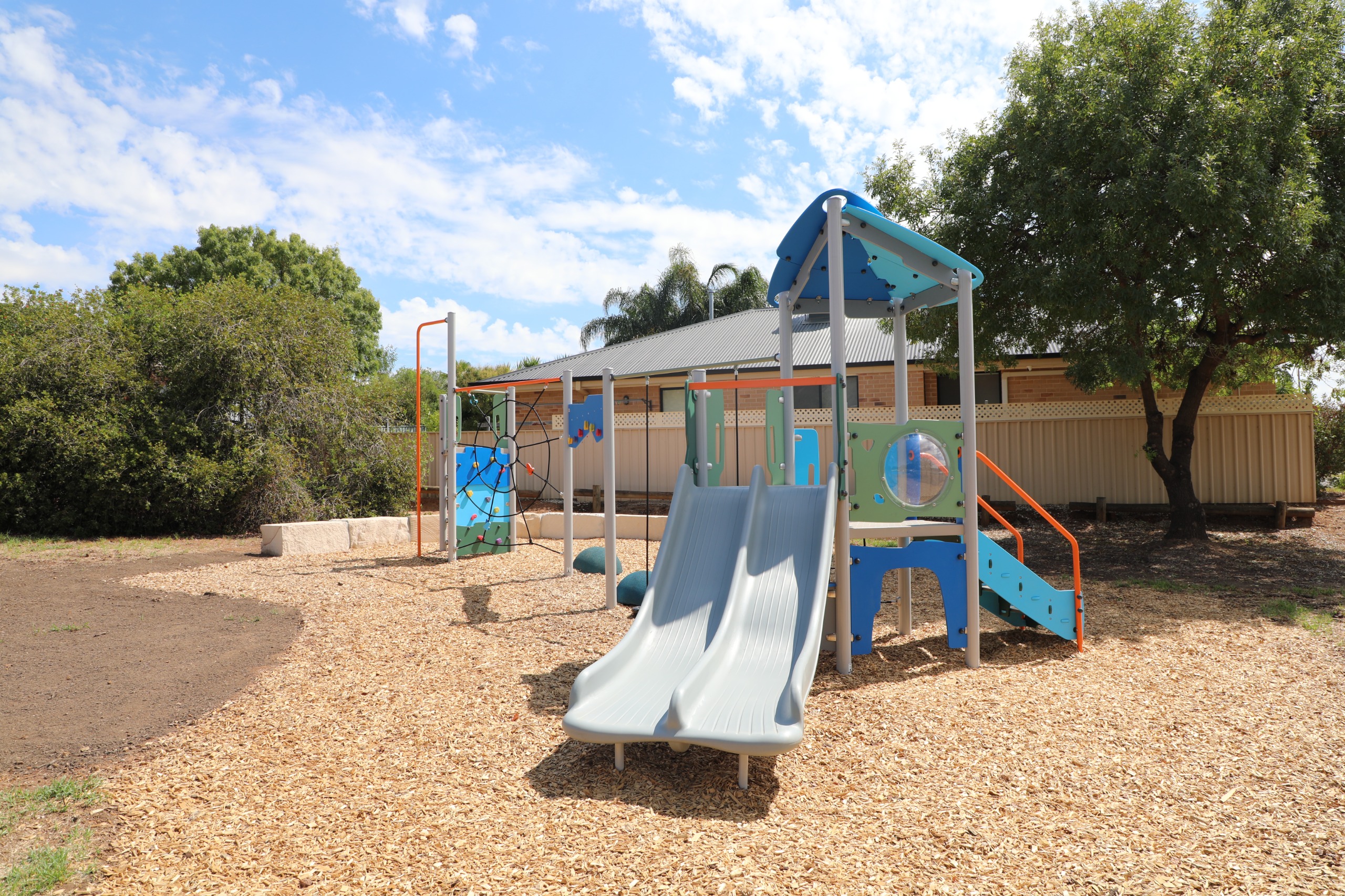 An image of the newly installed playground equipment at Ernie May Park showing the new playground equipment which was installed.